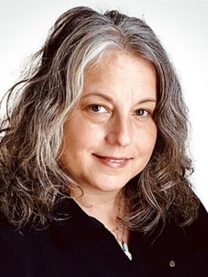 A woman smiling.