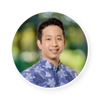  A man in a flowery shirt smiling