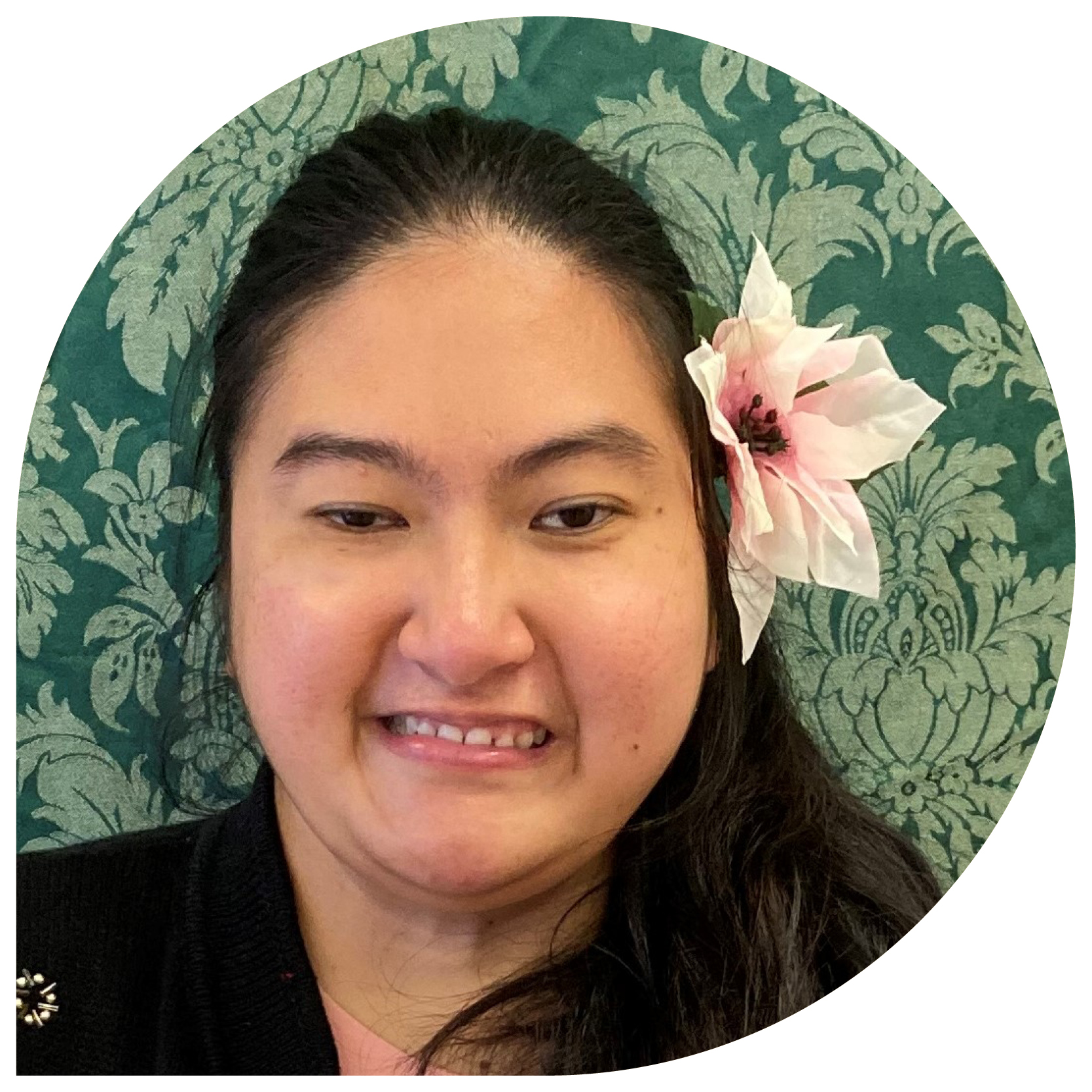 A mother and her toddler son smiling